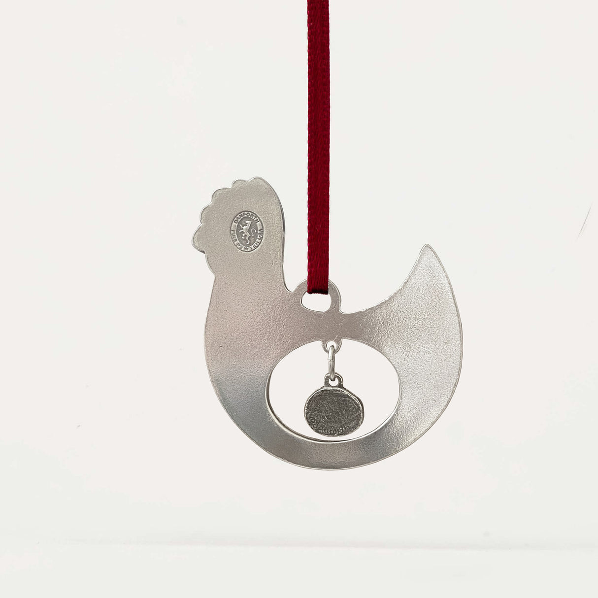 the backside of the chicken and egg ornament