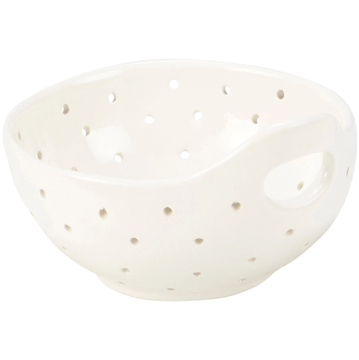 White ceramic colander with small holes on a white background