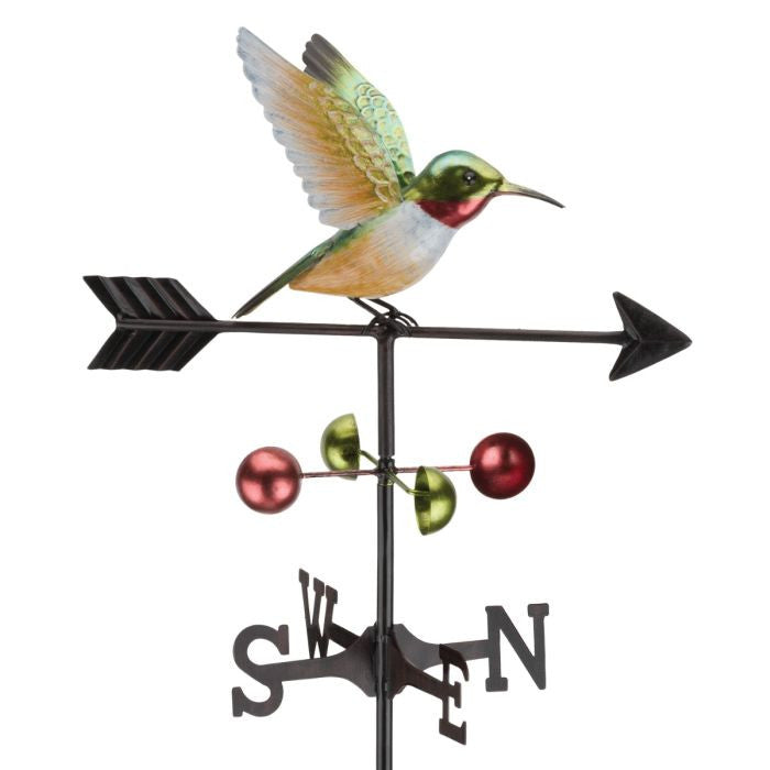 a classic weathervane with a ruby throated hummingbird sitting atop directional wind arrow