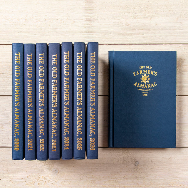 The 2026 Old Farmer's Almanac shown with past year editions