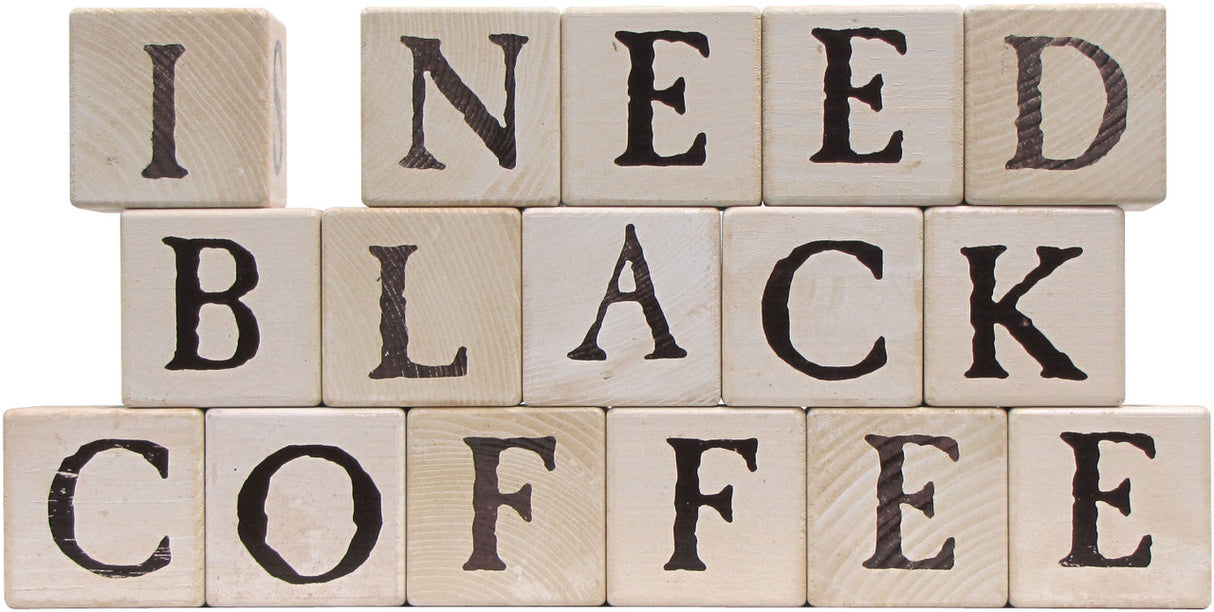 3 rows of stacked blocks spelling out "I need black coffee"