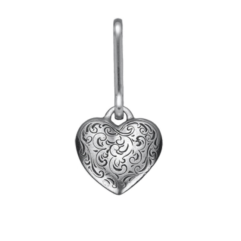 a heart shaped pewter zipper pull with intricate engraved details set against a white background