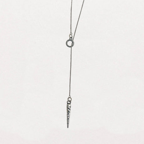 Stylish pewter icicle pendant necklace on an 18-inch sterling silver lariat chain, featuring a subtle, elegant design inspired by vintage Bakelite ornaments against a white background