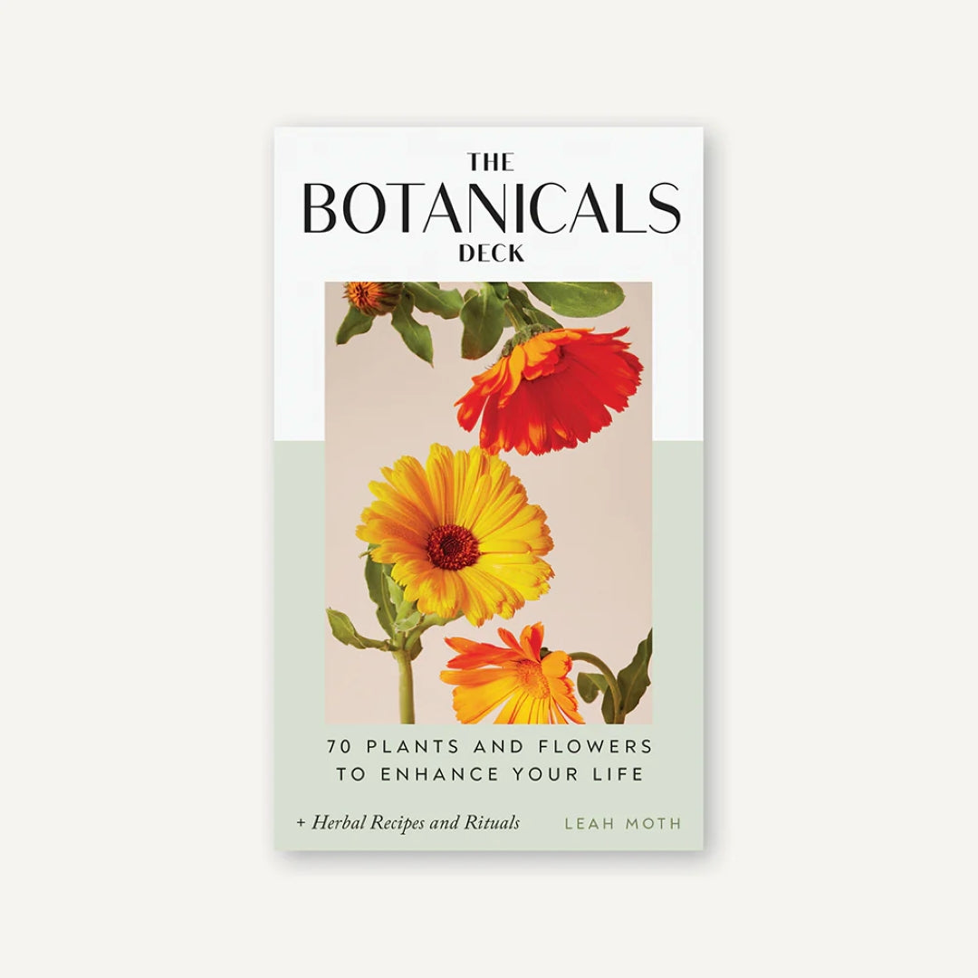Card deck titled 'The Botanicals Deck' with floral design on a white background
