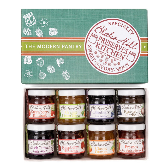 top down view of the eat love jam box with the lid removed to show the variety of jams included in the gift box
