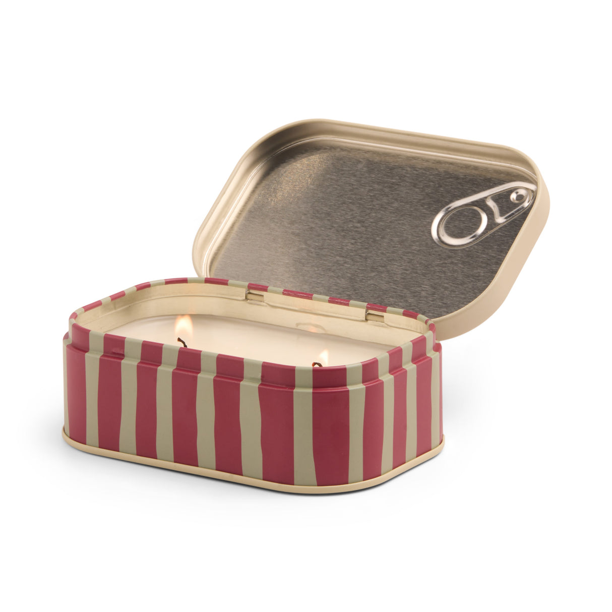 Striped candle in a metal tin with a lid on a white background