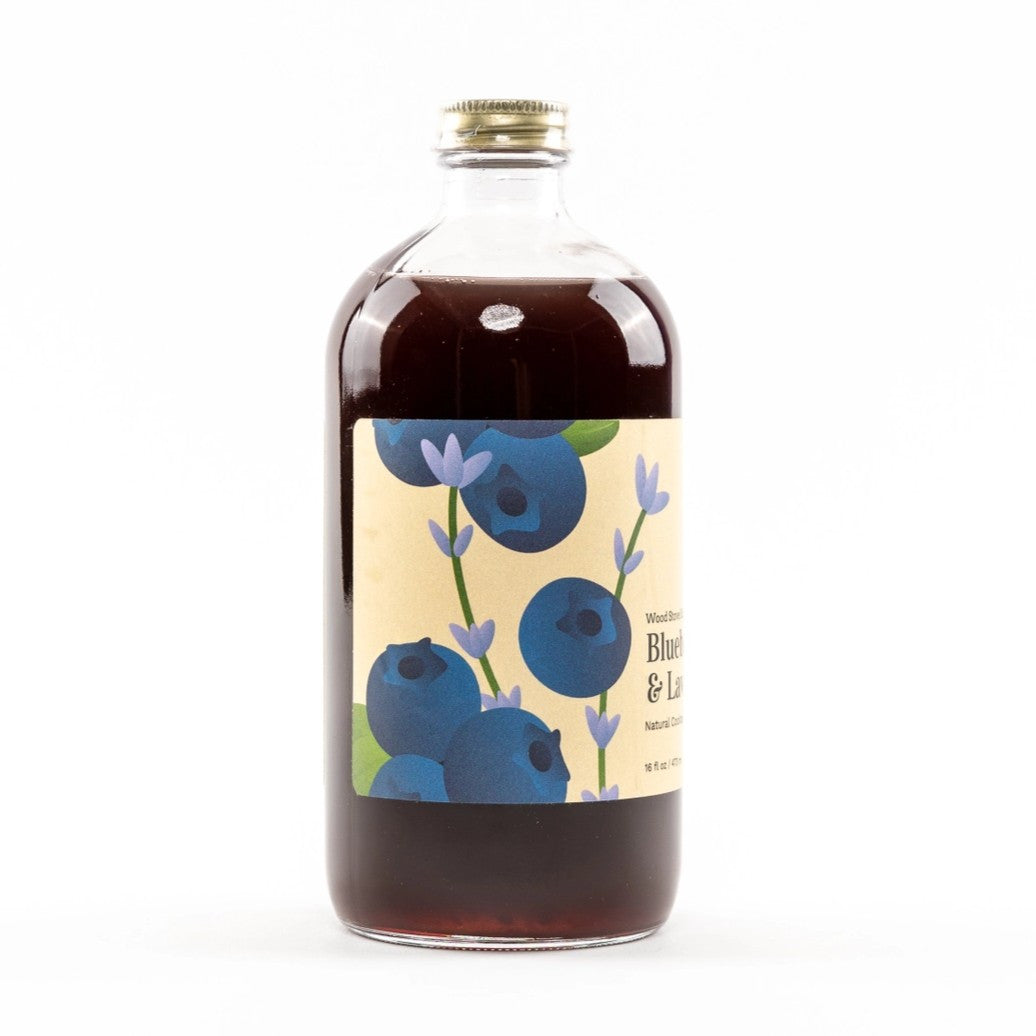 the side of the Blueberry & Lavender bottle showing the full label illustration with blueberries and lavender