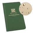a green hardcover notebook with a circle showing a page from the notebook with water beading on the surface showing the waterproof nature of the paper