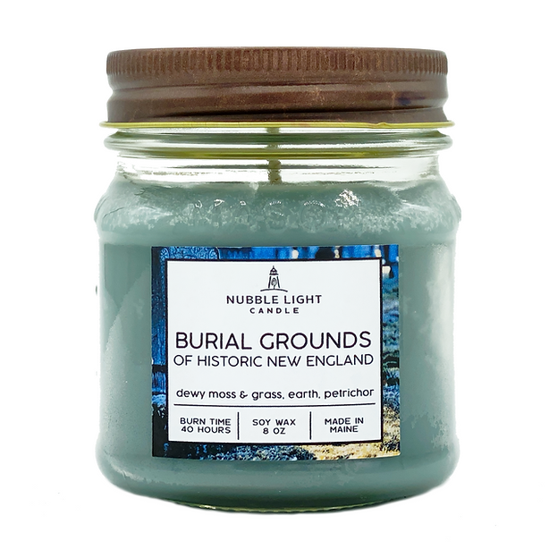 Jar of Nubble Light Candle labeled 'Burial Grounds of Historic New England' on a white background