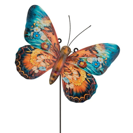 a closeup of the butterfly decor showing the vibrant patterns and blue, green, and orange coloring on the body and wings