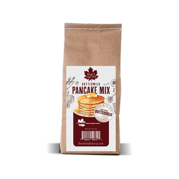a kraft paper pancake mix bag with white sticker label with an image of a stake of pancakes