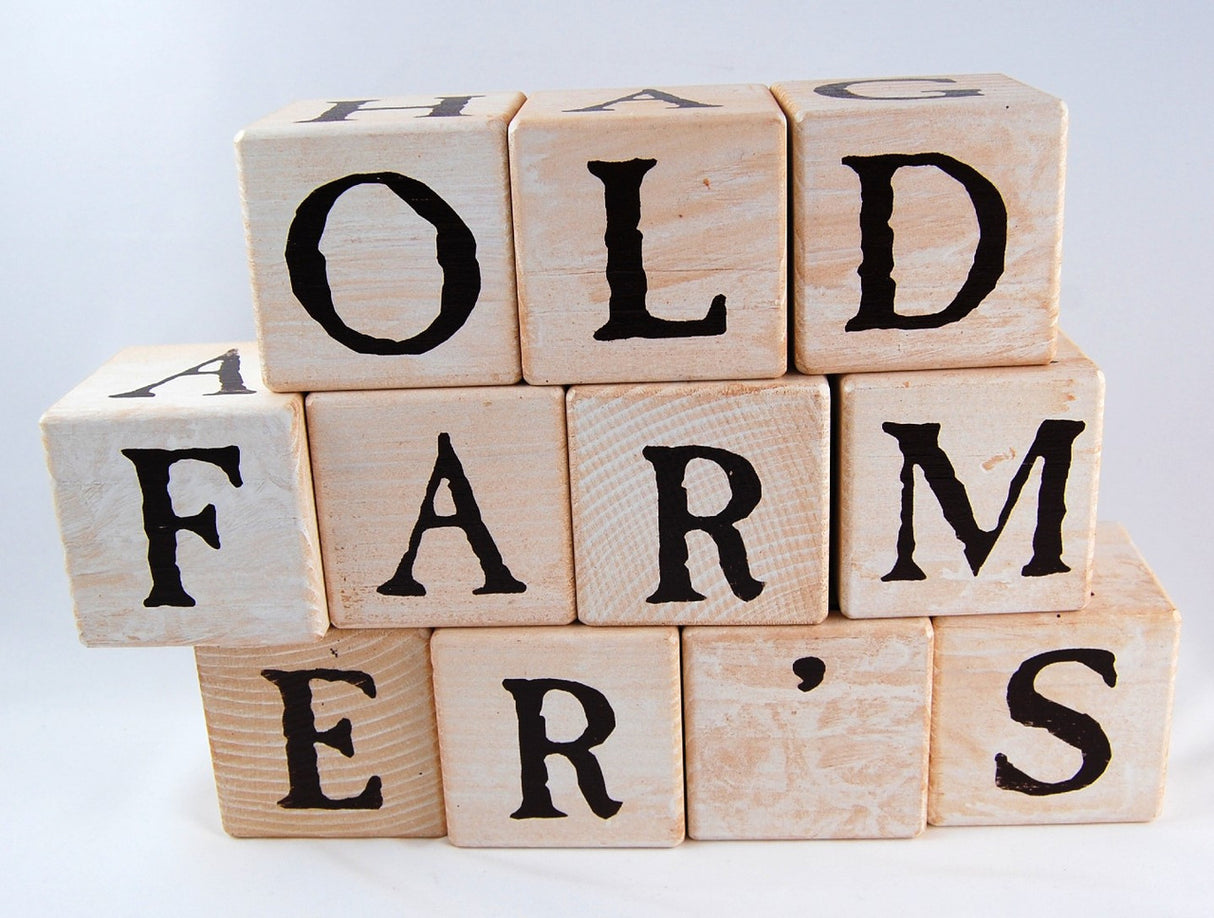 3 rows of stacked blocks spelling out "old farmer's"
