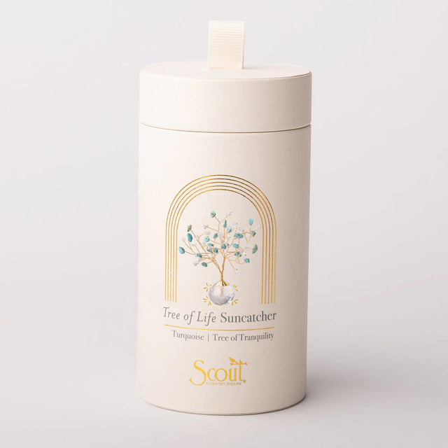 White cylindrical container with 'Tree of Life Suncatcher' design on a white background