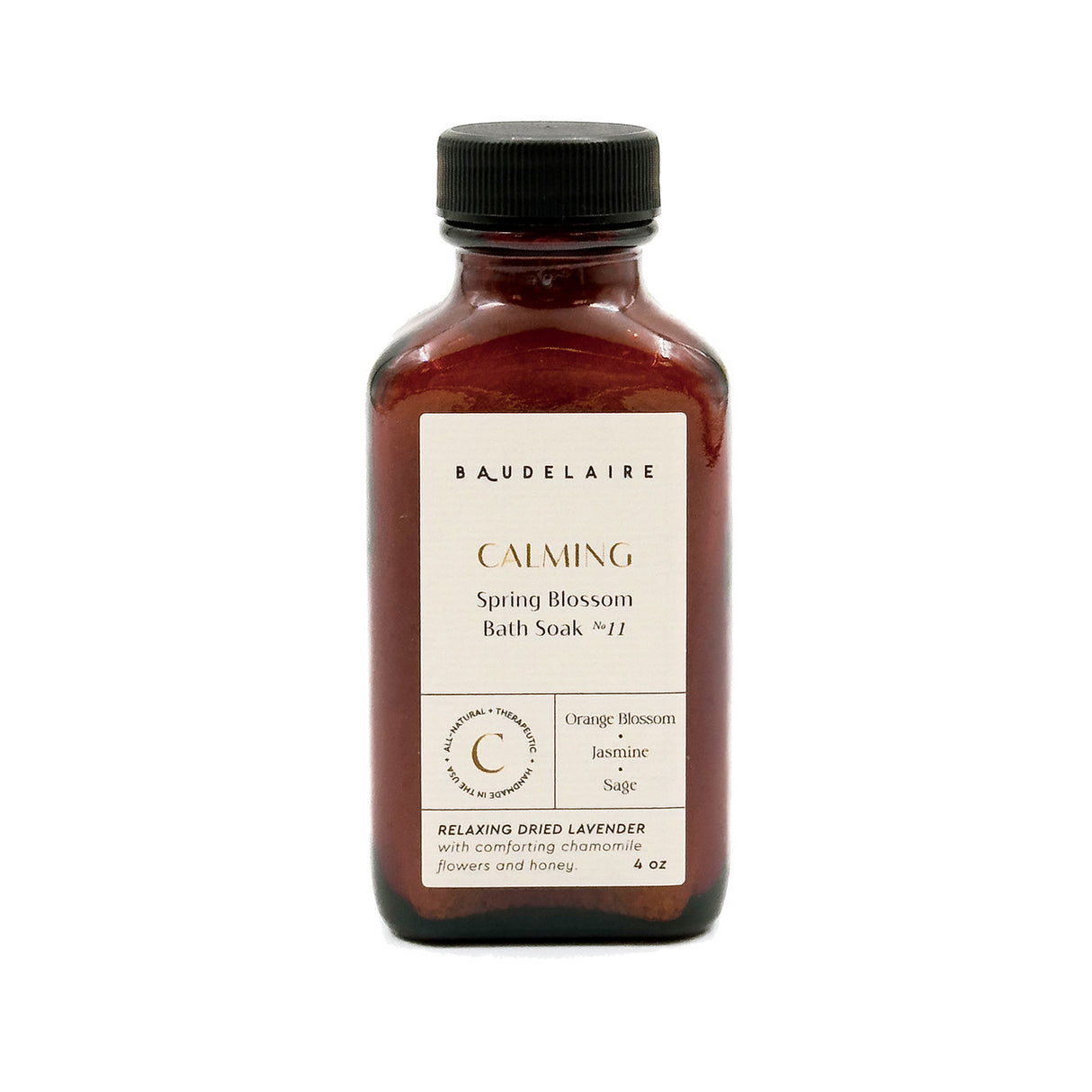 an amber colored apothecary style bottle with a black cap and off white label that reads "Baudelaire - Calming - Spring Blossom Soak no. 11 - Orange Blossom - Jasmine - Sage"