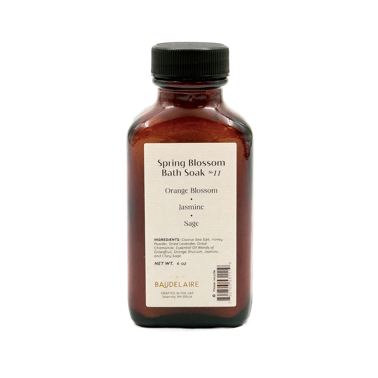an amber colored apothecary style bottle with a black cap and off white label that reads "Spring Blossom Soak no. 11 - Orange Blossom - Jasmine - Sage" with an ingredients list and business address