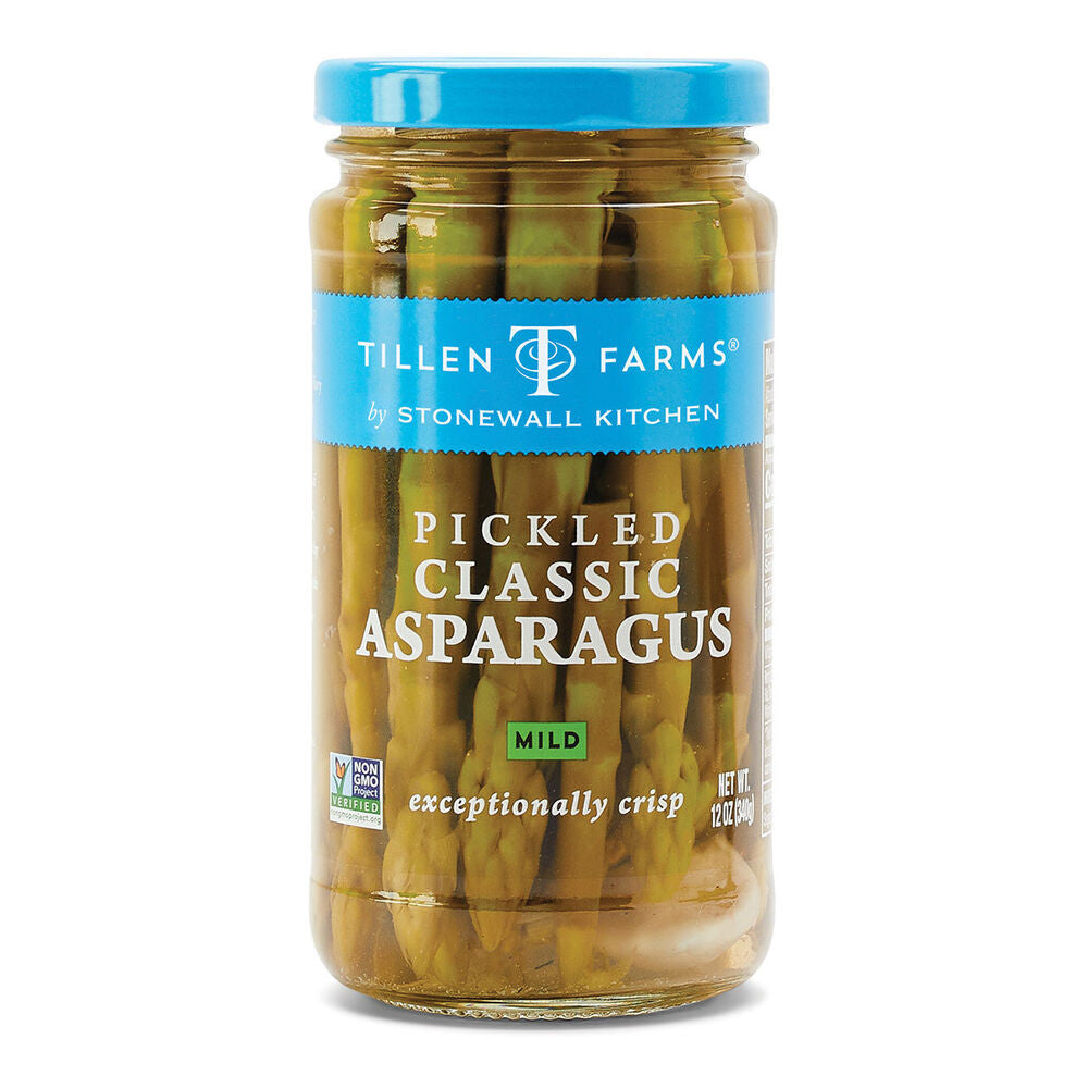 a tall narrow jar filled with pickled asparagus and with a sky blue lid