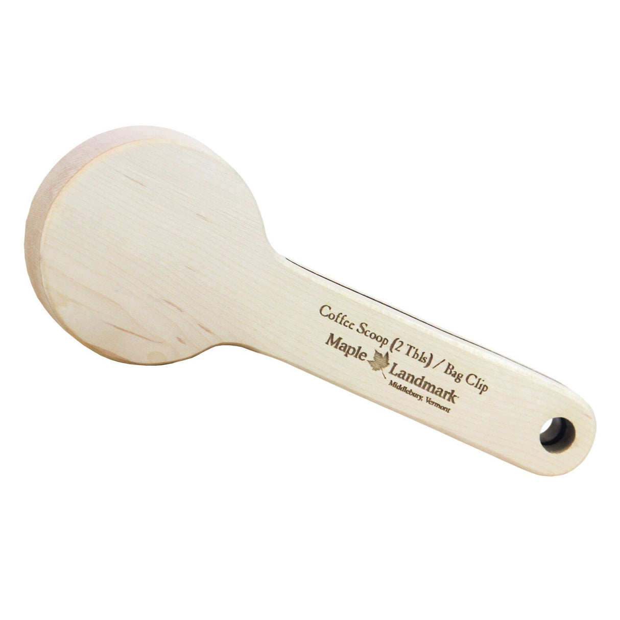 the backside of the coffee scoop with Maple Landmark logo and measurment label showing the scoop is 2 tablespoons