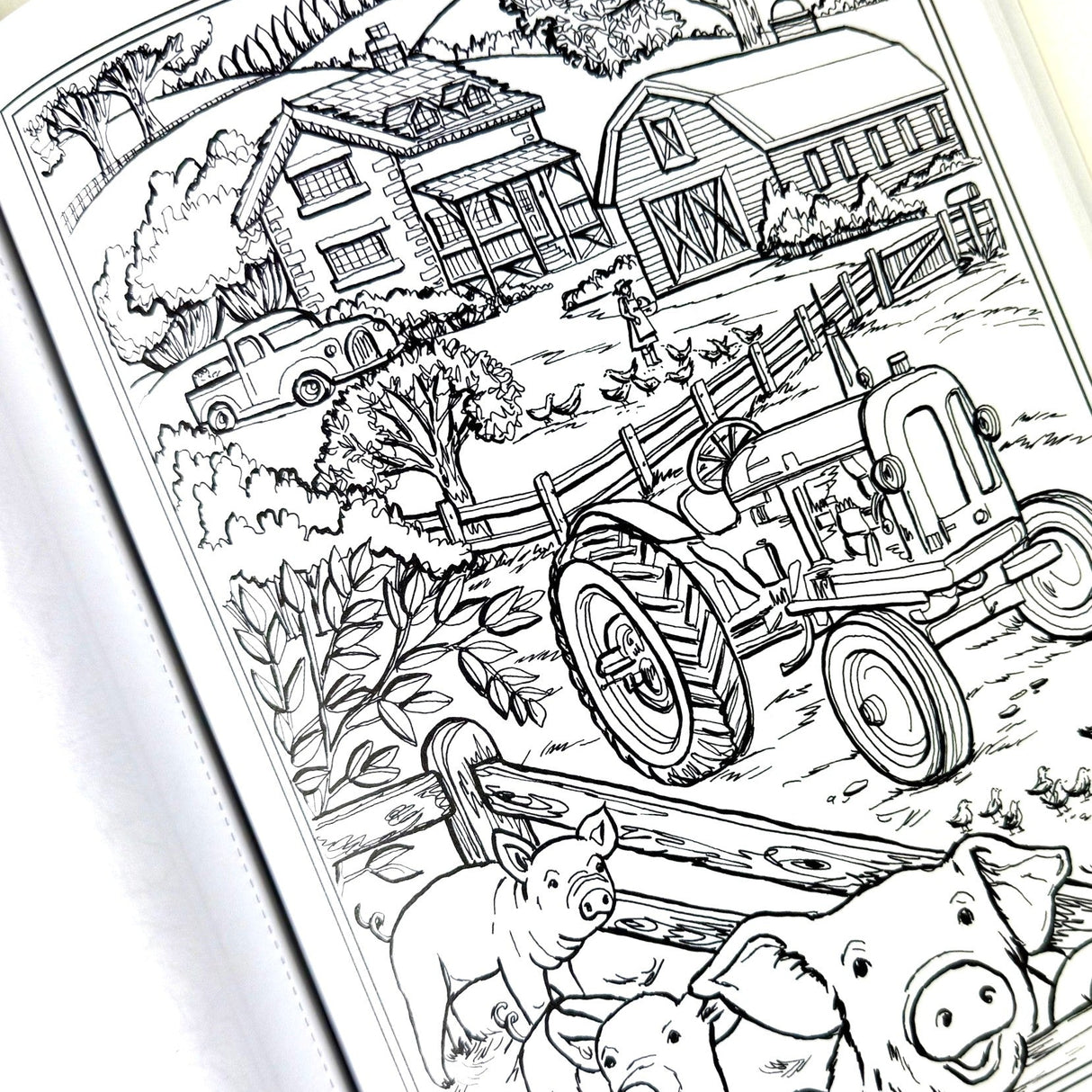 Coloring book page with a farm scene featuring a tractor, barn, and pigs.
