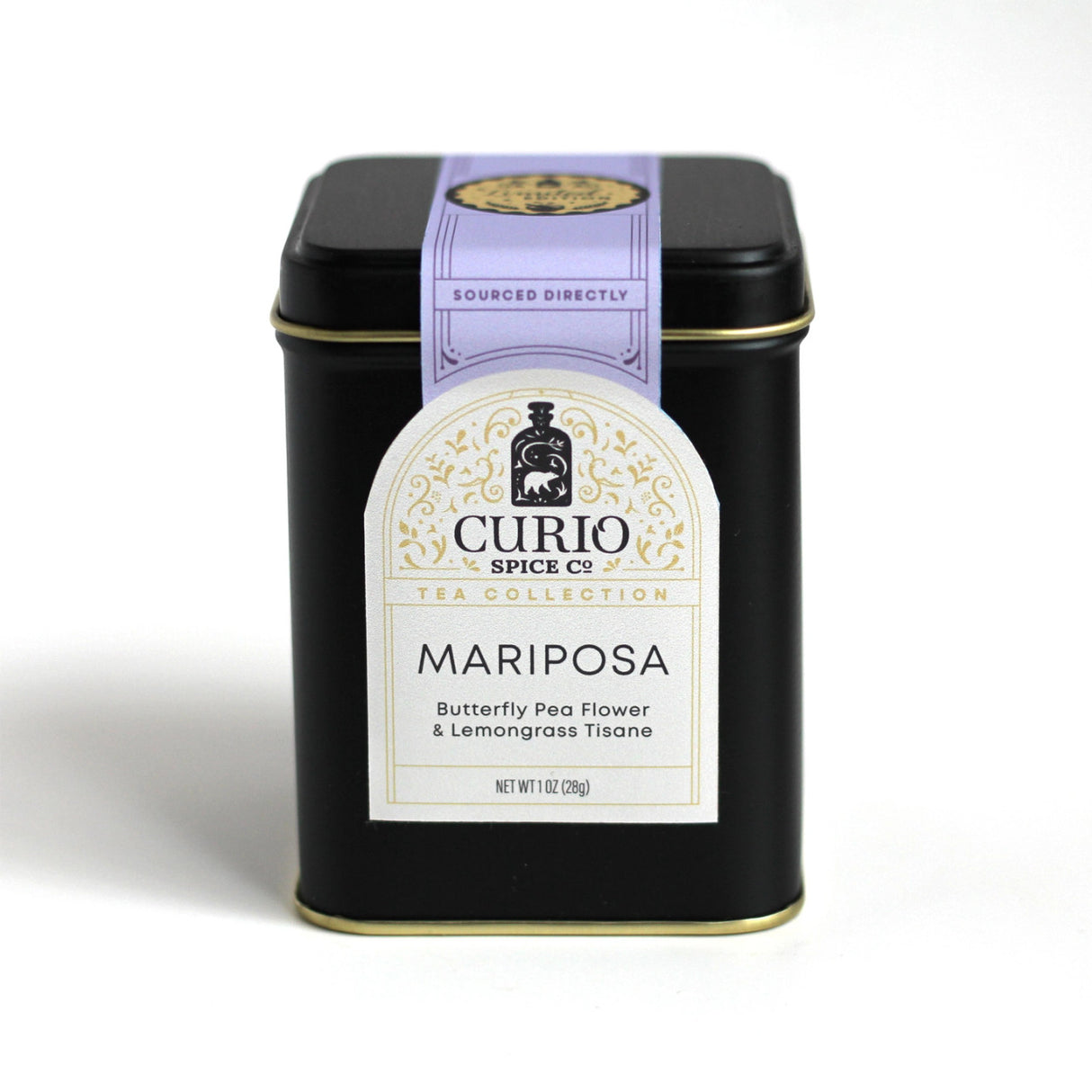 the black tea tin for the Mariposa tea with elegant off white label and purple seal