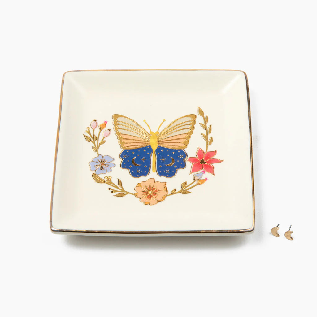 Decorative square plate with a butterfly and floral design on a white background