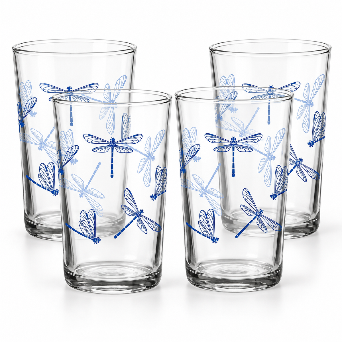 Four clear drinking glasses with blue dragonfly illustrations, arranged in a studio shot on a white background.