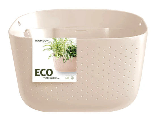 a plastic wall planter in oat with packaging affixed to the front that reads ECO and has an image of the planter filled with plants