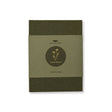 the field press with green linen cover and gold foil floral detail, comes in a hemp paper wrap