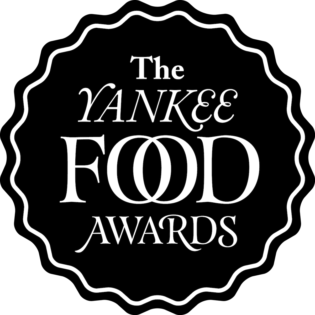 black medallion logo with the text "the yankee food awards" printed inside of it