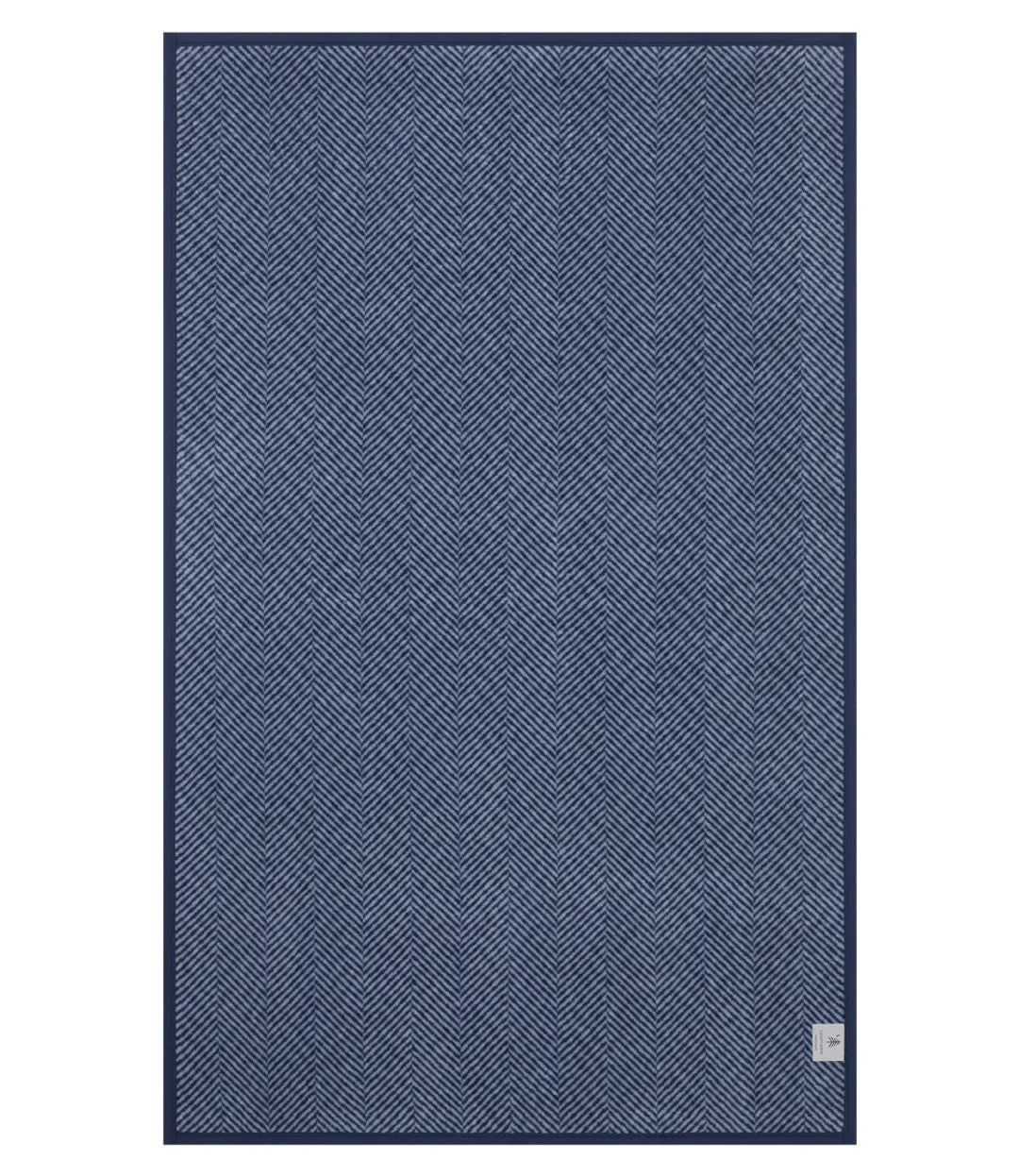 The back of the Harborview Herringbone Navy Blanket showing the mirror image and reverse color of the full size and Herringbone design in Navy and Fog color scheme