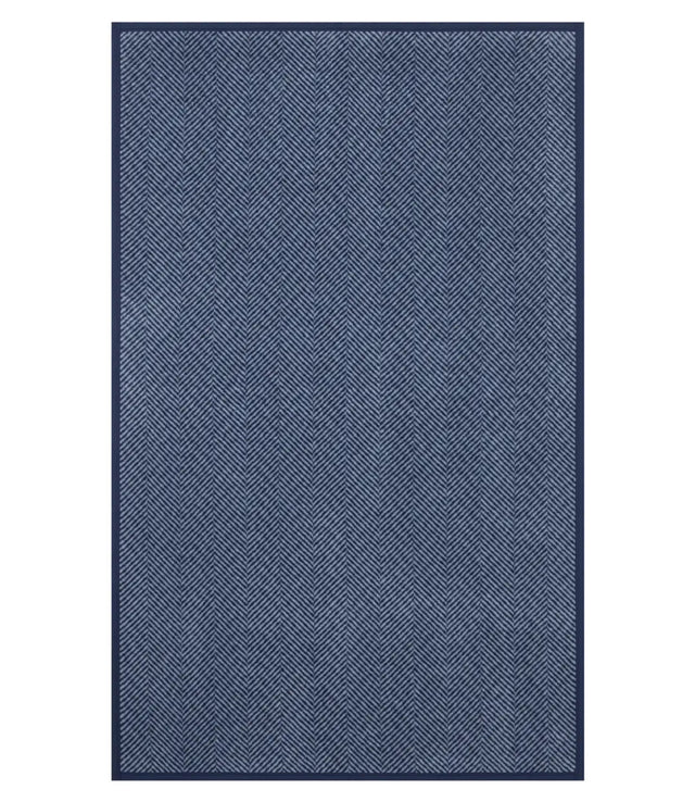 The front of the Harborview Herringbone Navy Blanket showing the full size and Herringbone design in Navy and Fog color scheme