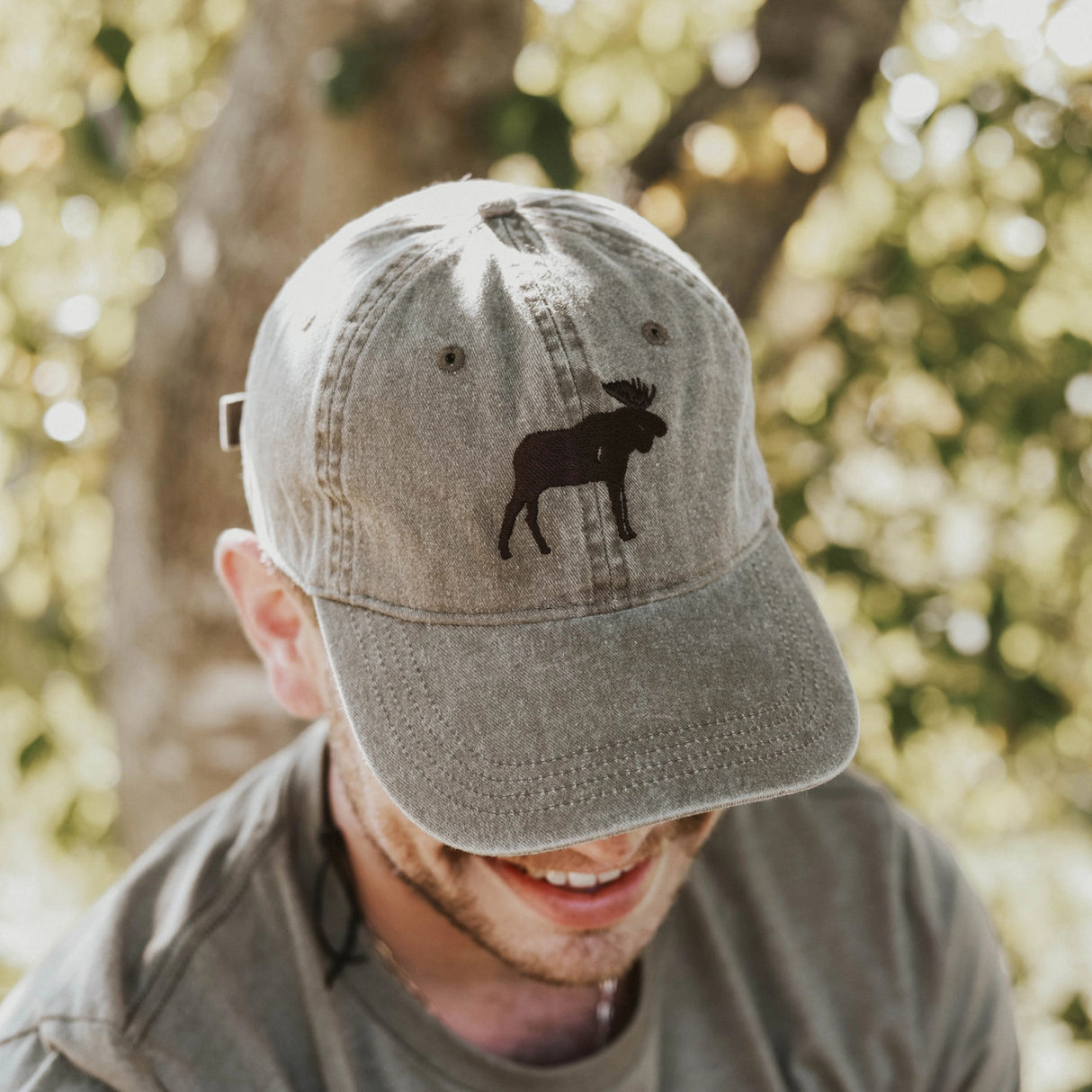 the moose cotton cap worn by a model enjoying the great outdoors