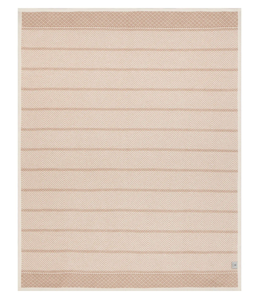 The back of the Old Port Herringbone Tan blanket showing the full size and Ivory and Tan color scheme