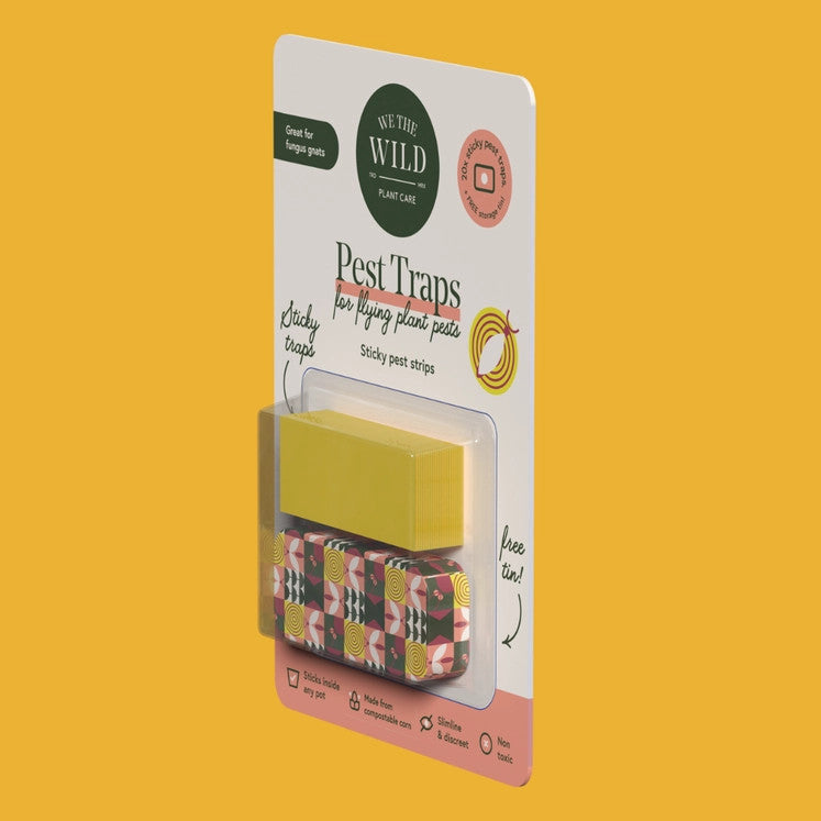 the pest traps package at a side angle against a yellow background