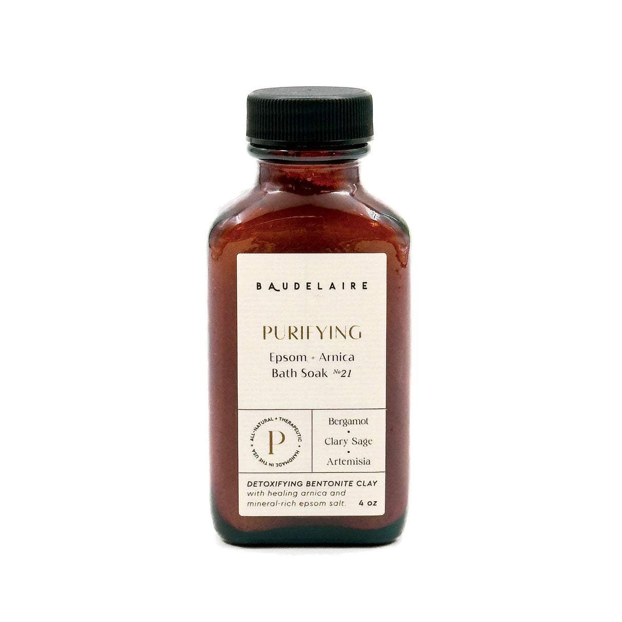 an amber colored apothecary style bottle with a black cap and off white label that reads "Baudelaire - Purifying- Epsom + Arnica Soak no. 21 -Bergamot - Clary Sage - Artemisia"