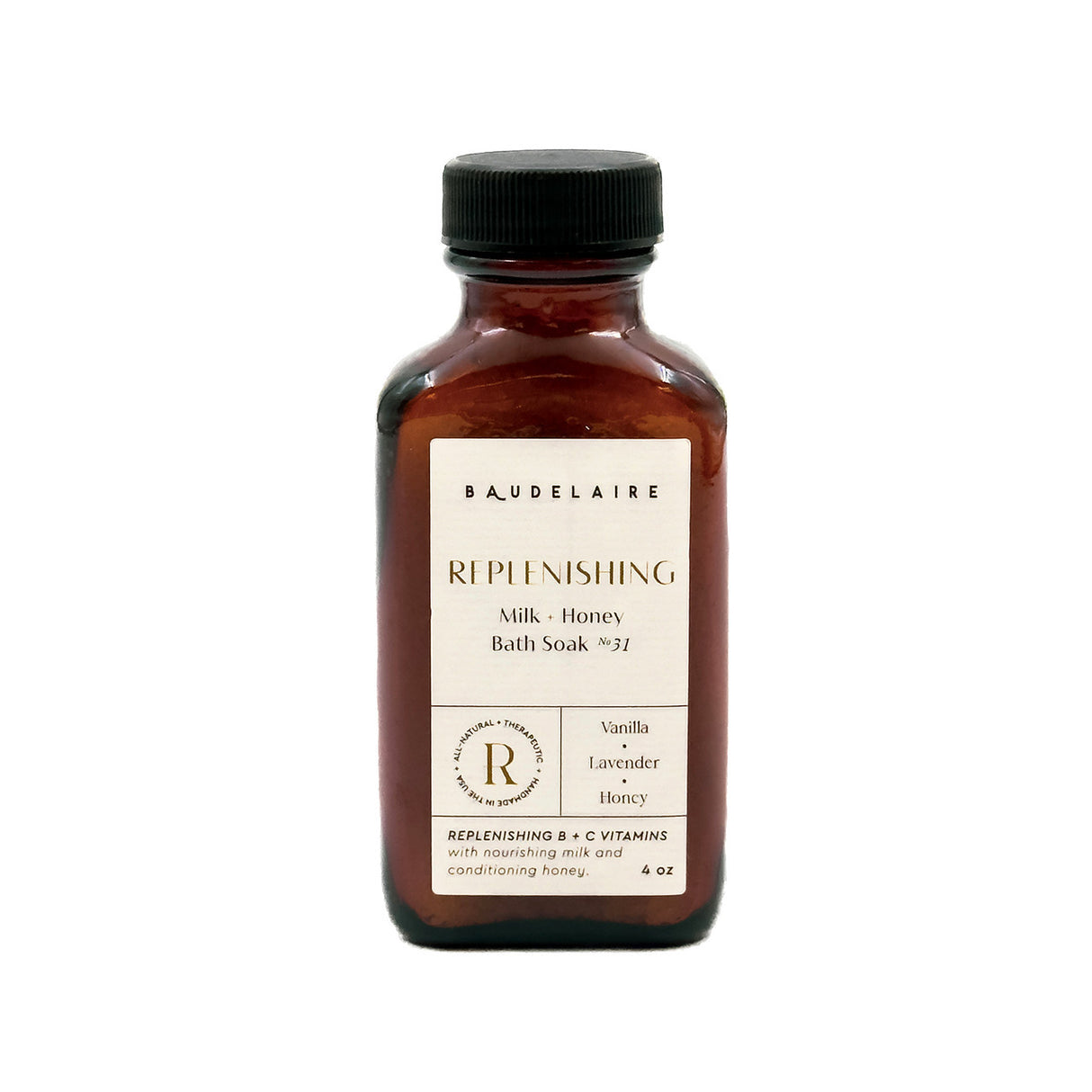 an amber colored apothecary style bottle with a black cap and off white label that reads "Baudelaire - REPLENISHING- Milk + Honey Bath Soak no. 31 - Vanilla - Lavender - Honey"