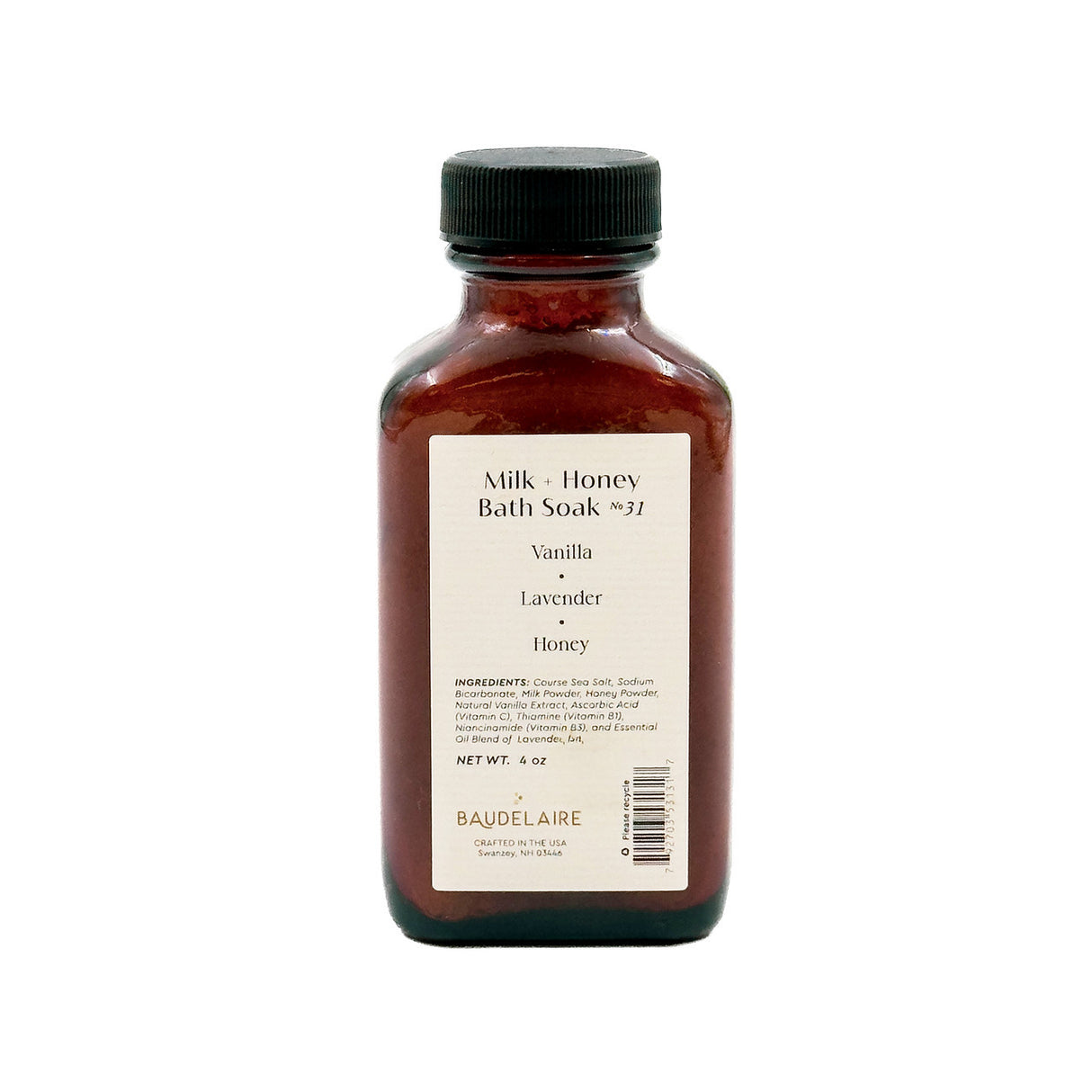 an amber colored apothecary style bottle with a black cap and off white label that reads "REPLENISHING- Milk + Honey Bath Soak no. 31 - Vanilla - Lavender - Honey" with an ingredients list and business address