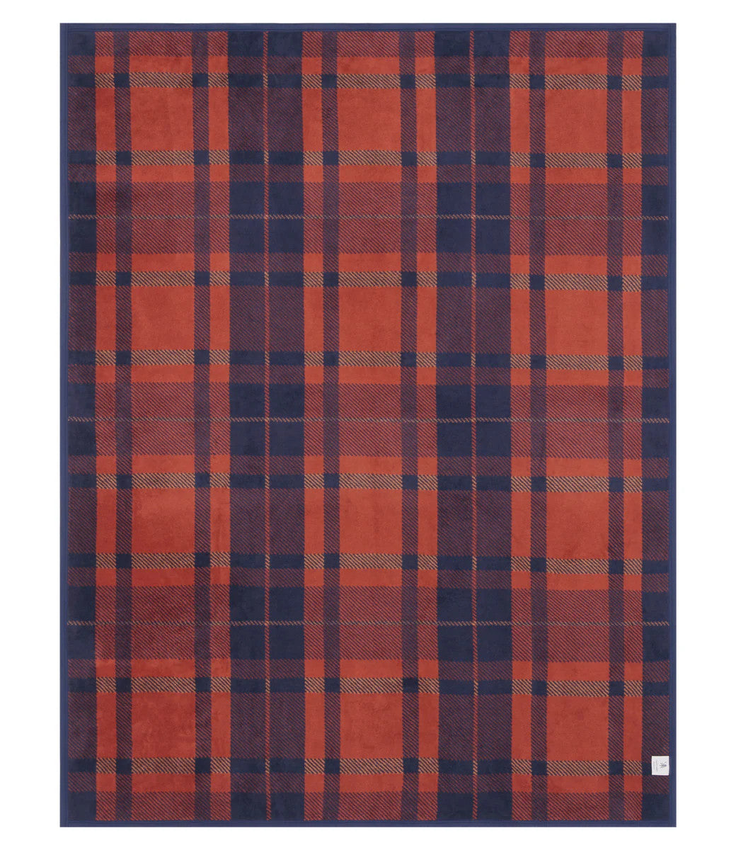 The back of the Sebago Tartan blanket showing the full size and navy, rust, and desert red color scheme