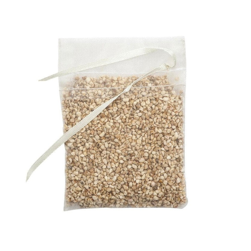 the scent away pouch, which looks like a mesh tea bag filled with beige gravelly material