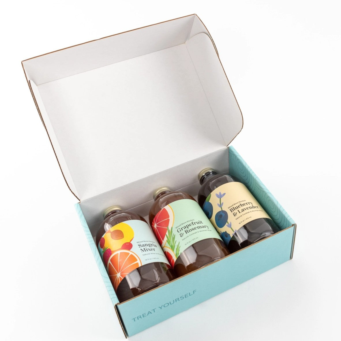 a close up of an open Summer Survival kit showing all three bottles inside