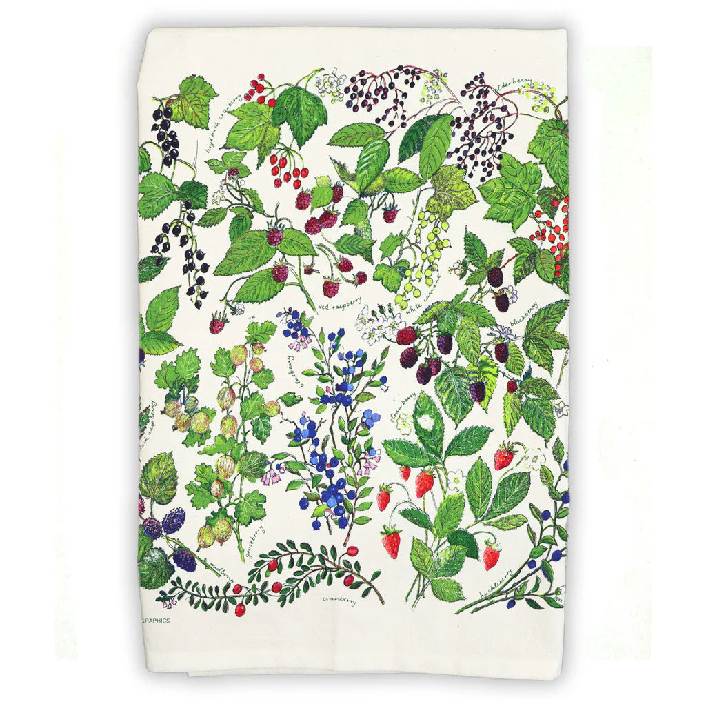 a tea towel folded to display the vibrant artwork of various wild berries including blueberries, raspberries, strawberries, cranberries, blackberries, and more