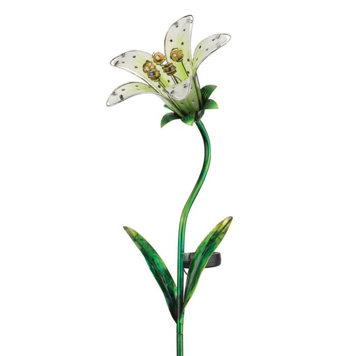 a close up of the white tiger lily solar stake against a white background