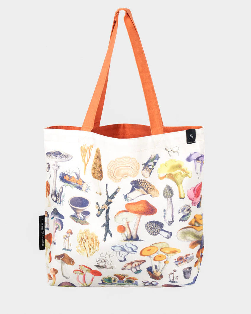 side one of the woodland mushrooms tote; a white tote bag with orange straps covered in vintage illustrations of woodland mushrooms