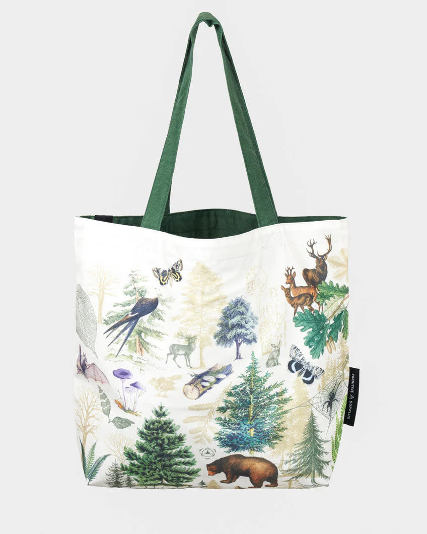 side two of the into the woods tote; a white tote bag with forest green straps covered in vintage illustrations of woodland flora and fauna