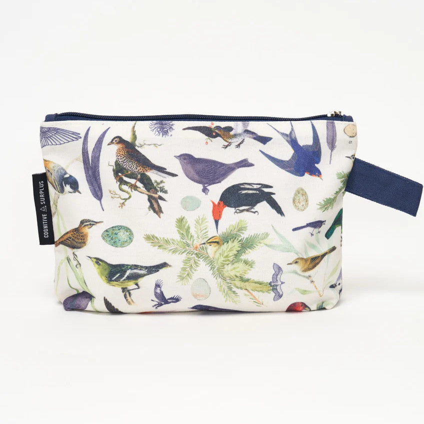 the back side of the white canvas zipper pouch with vintage illustrations of various birds all over. the pouch has a navy blue strap for easy carrying