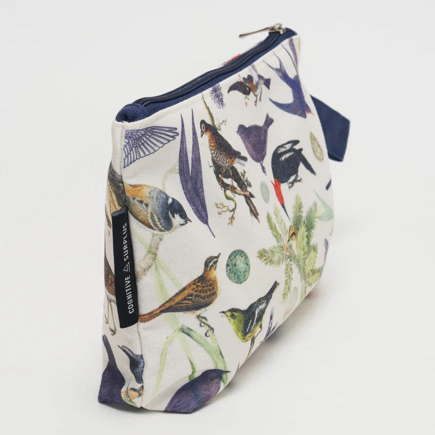 a side angle of white canvas zipper pouch with vintage illustrations of various birds all over.