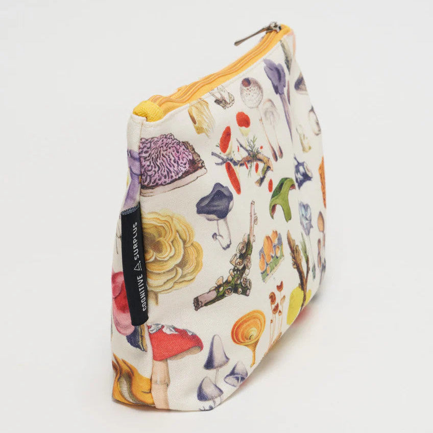 a side angle of white canvas zipper pouch with vintage illustrations of woodland mushrooms