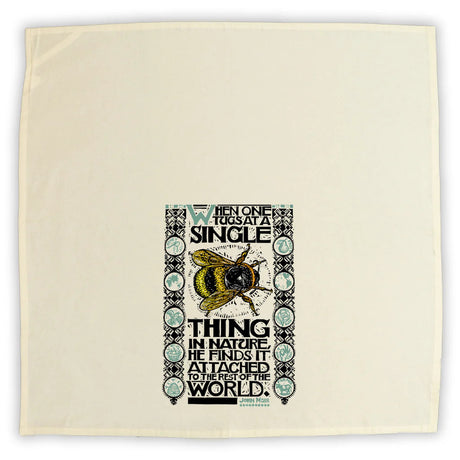 the unfolded bee tea towel showing the design at the bottom center of the towel to best display the design when folded