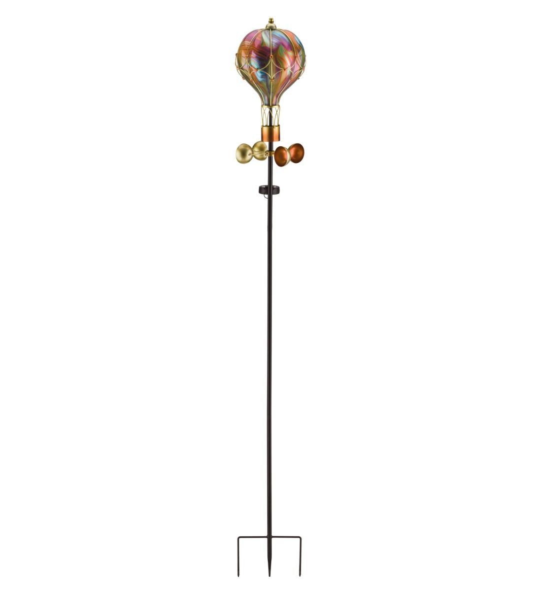Full length view of the hand-blown glass hot air balloon solar stake - The image features a decorative garden stake with a spiral, orange-colored hot air balloon spinner that rotates in the wind. The spinner has a vibrant orange hue with a marbled effect, and it is attached to a black stake with a solar-powered light at the top.