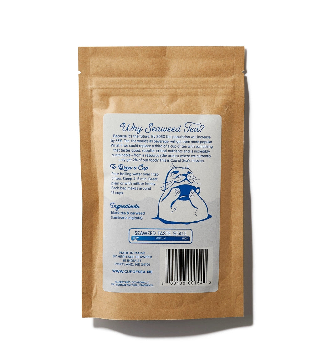 the back of the bold coast breakfast seaweed tea package featuring seaweed health benefits, ingredients, brew guide, a graphic showing that this tea has a low seaweed taste, and a graphic of a seal rising out of the sea holding a cup of tea