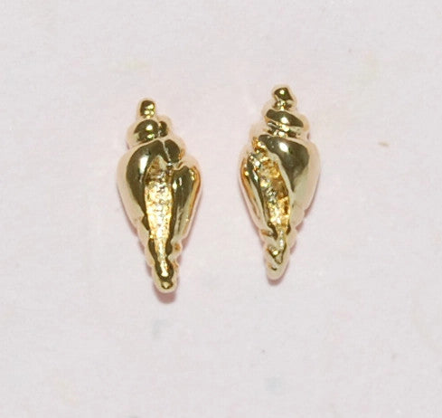 close up of petite gold conch shell stud earrings on a white surface